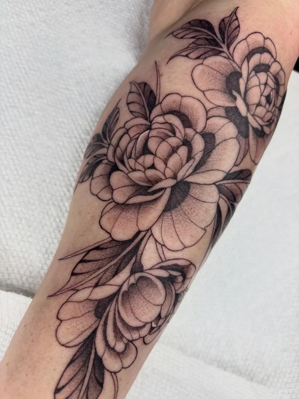 Delicate peonies tattoo by Valerie Mourningstar